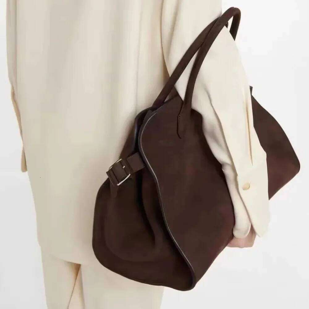 Chic Brown Suede Hobo Bag with Adjustable Buckle Strap Casual Slouchy Design Perfect for Daily Errands and Office Wear