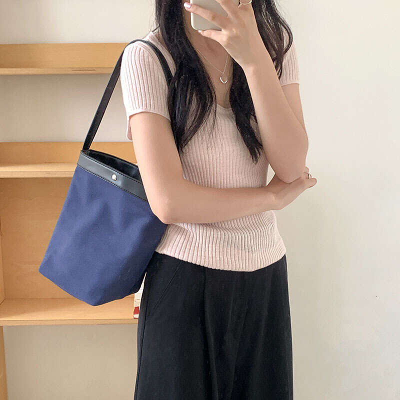 Korean Niche Summer Color-Block Bucket Large Capacity Canvas Commuter Light Luxury Style Shoulder Bag B5