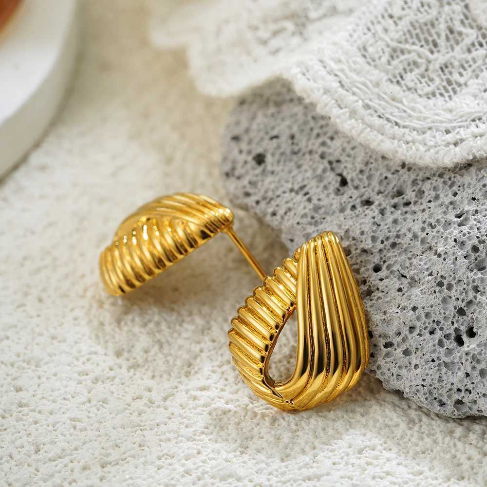 Vintage stainless steel staggered striped hollow water drop earrings with water drop texture earrings with temperament persona Y251018