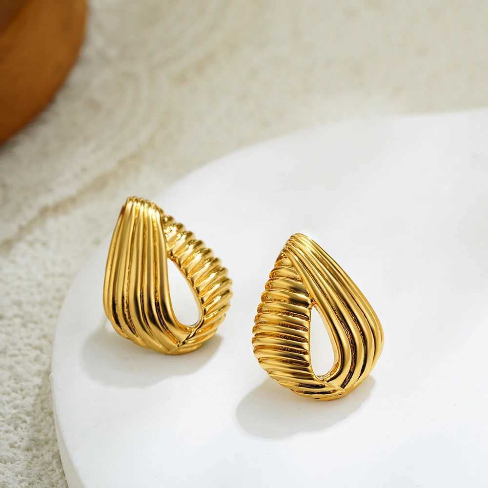 Vintage stainless steel staggered striped hollow water drop earrings with water drop texture earrings with temperament persona Y251018