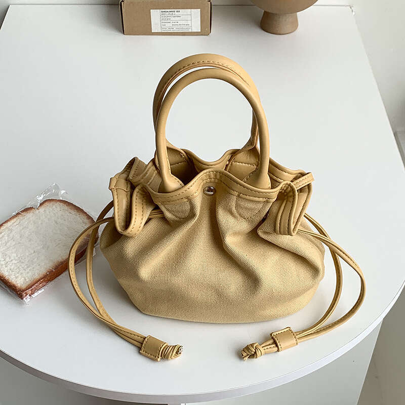 Spring New Canvas Drawstring Bucket Niche High-End Feel Women Solid Color Simple Versatile Handheld Small Tote Bag B5