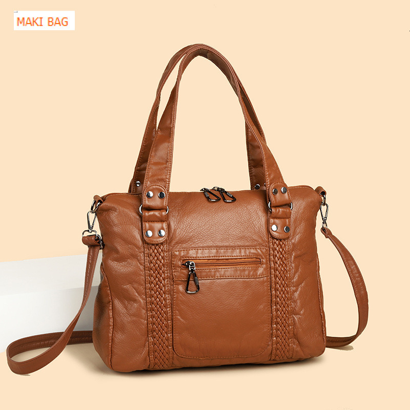Cross border hot selling French retro motorcycle bag, single shoulder crossbody bag, large capacity women's washable handbag, designer bag