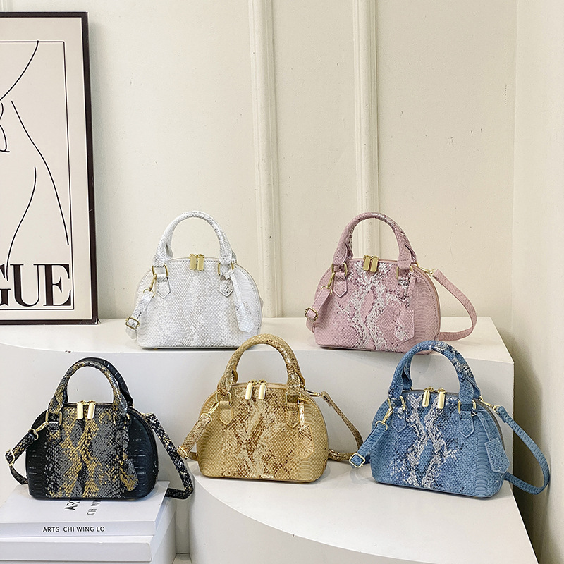 Free shipping designer Fashion Bags New women handbag hand-held shell bag snake patterned single shoulder crossbody bag