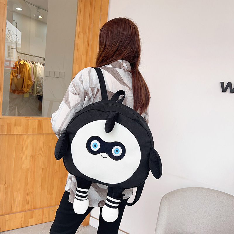 Designer's new fashionable large capacity cartoon canvas bag, cute egg party backpack, casual fashion hot selling small crossbody bag