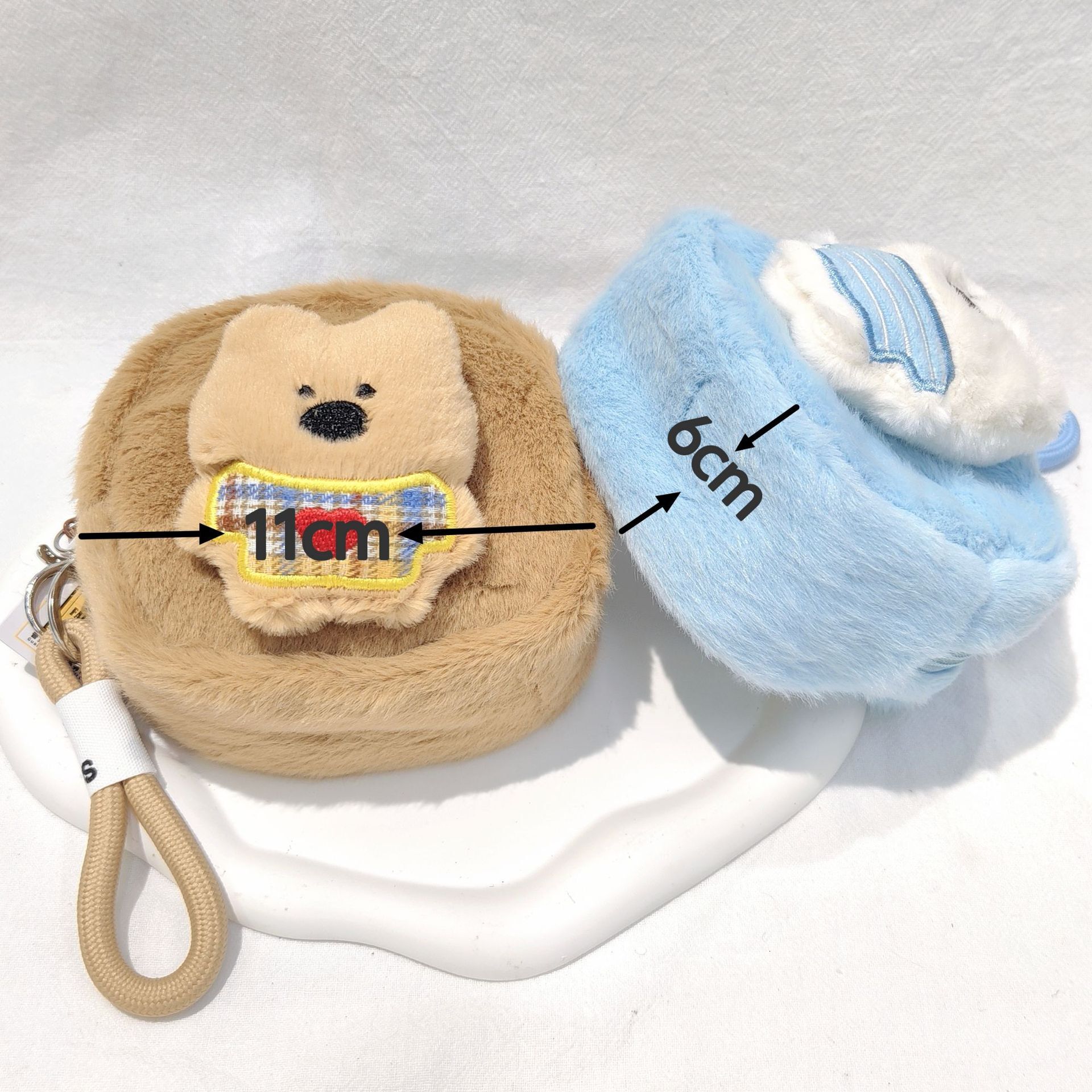 Designer's new cute pet plush coin wallet cartoon cute headphones key storage bag backpack pendant square small plush bag