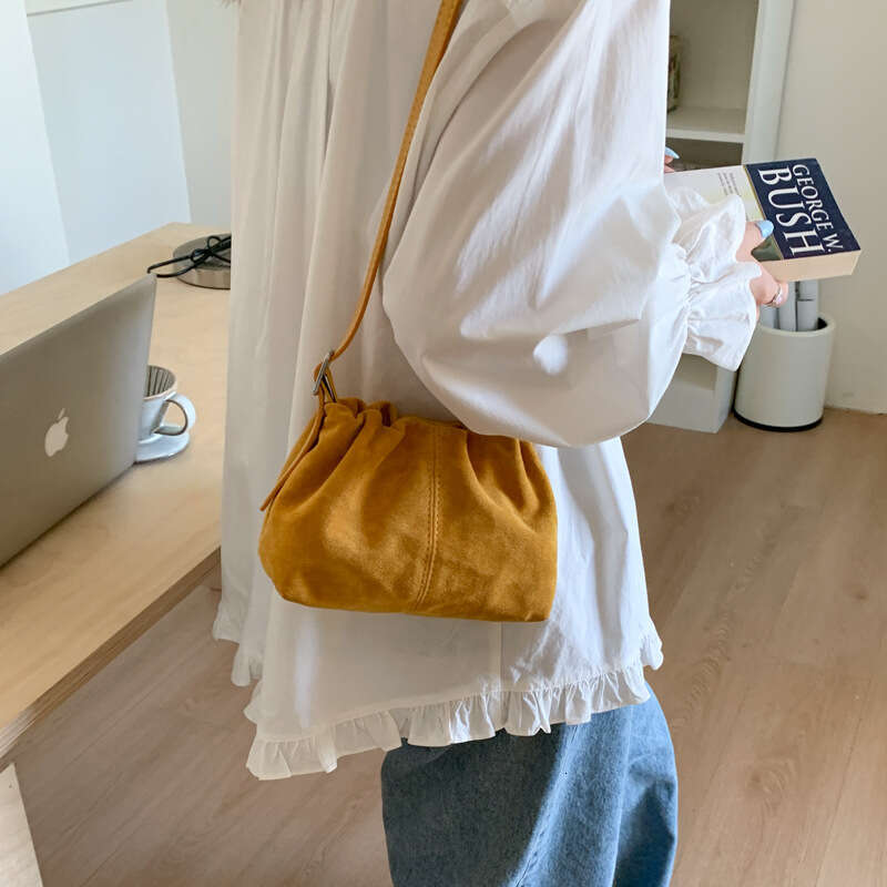 Designer Bag Shoulder Bag Luxury Bag 2025 New Korean Version INS Red Suede Drawstring Bucket Simple Versatile Commuter Shoulder Crossbody