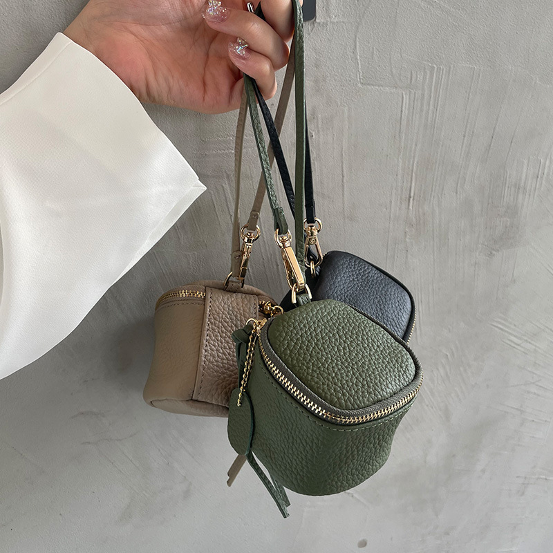 Luxury Brand Designer Bag Coin Purse Top Layer Cowhide Coin Bag Coin Bag Handheld Genuine Leather Key Bag Earphone Lipstick Cushion Bag