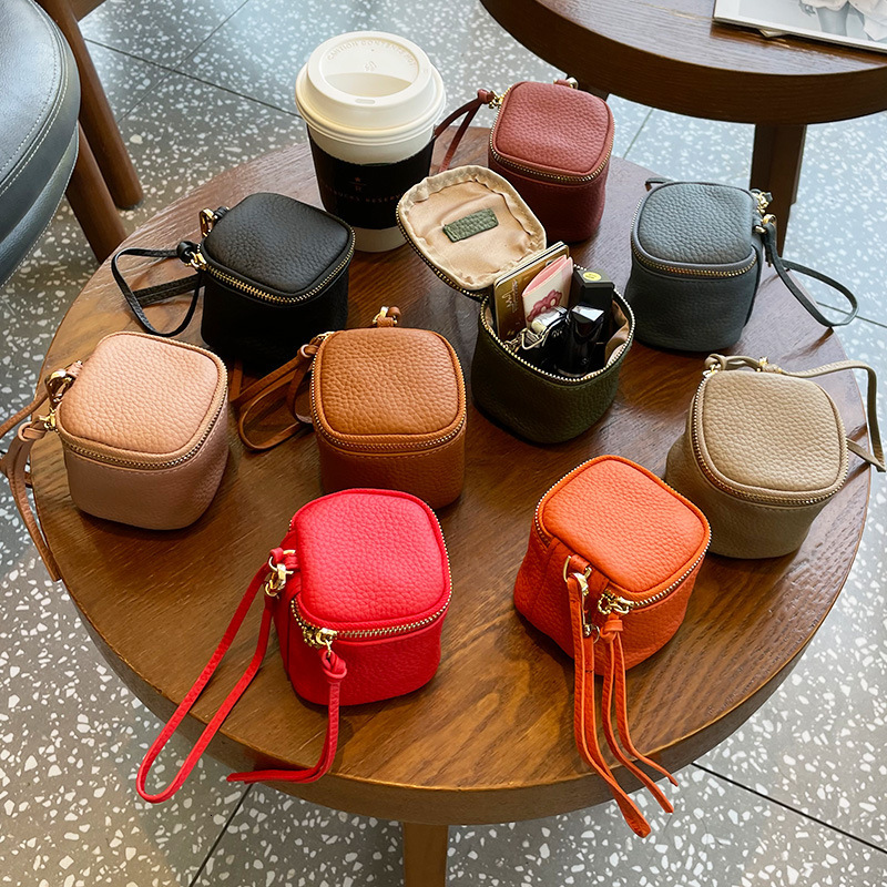 Luxury Brand Designer Bag Coin Purse Top Layer Cowhide Coin Bag Coin Bag Handheld Genuine Leather Key Bag Earphone Lipstick Cushion Bag