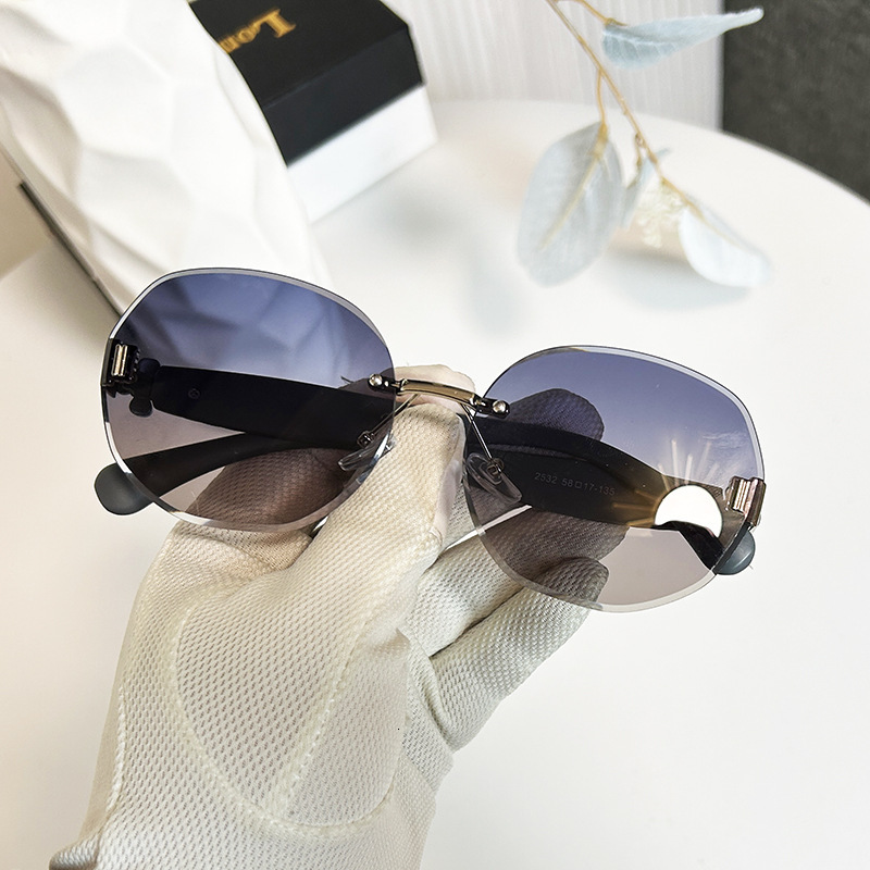 Luxury Brand Designer Jewelry Egg-Shaped Oval Rimless Glasses Wave-Shaped Four-Leaf Clover Temple Sunglasses For Women Fashionable Light Luxury Elegan