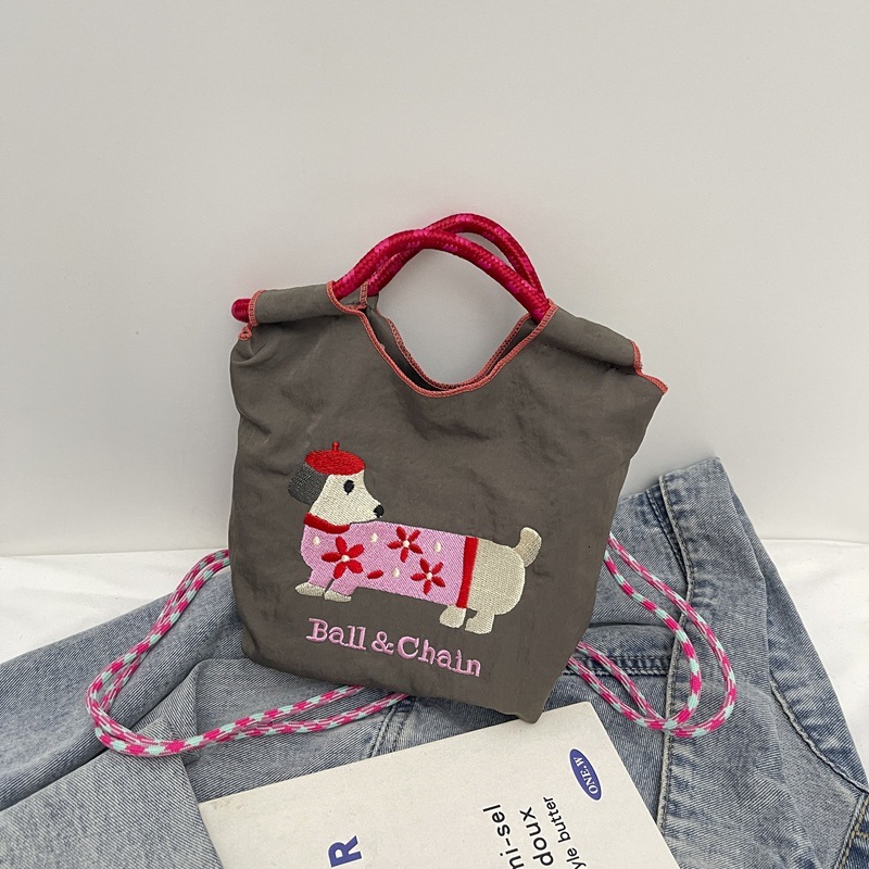 New Korean style designer embroidered cute sausage dog cartoon color blocked women's fashionable handbag multifunctional commuting shoulder bag