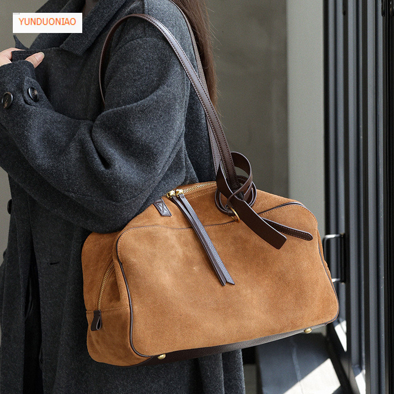 Matte texture women's shoulder bag cowhide bowling bag genuine leather 2025 new luxury commuting handbag autumn and winter new designer bag