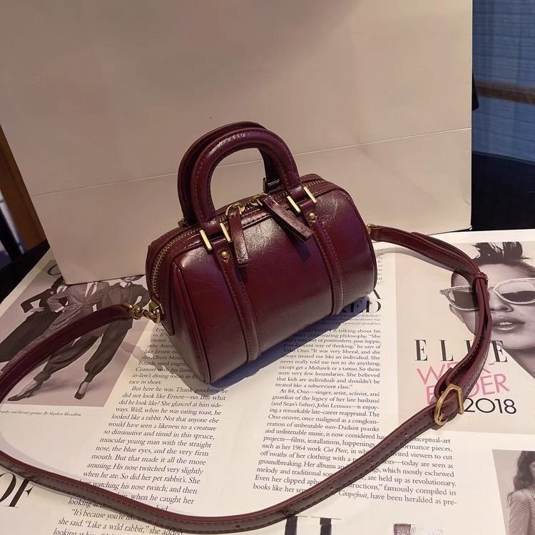 Retro women s pillow bag niche cylindrical bag fashionable texture women s shoulder bag handheld women s crossbody bag autumn new designer bag