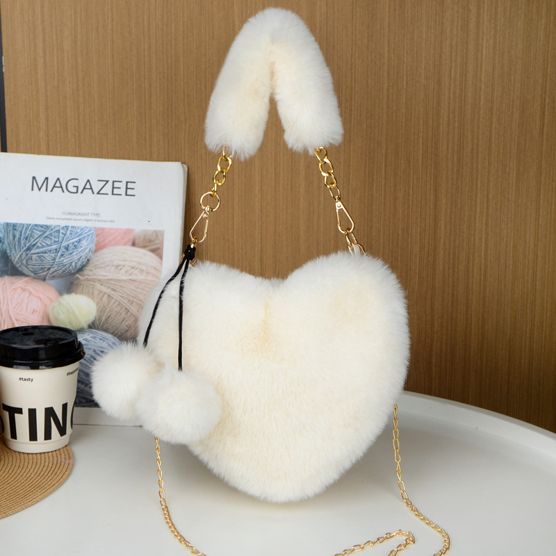 New rabbit fur plush designer cute and fashionable women's hand-held heart-shaped bag, single shoulder slanted body large capacity bag