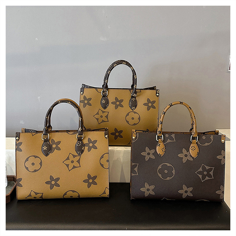 Free shipping Womens new fashionable versatile handbag with simple design large capacity shoulder bag