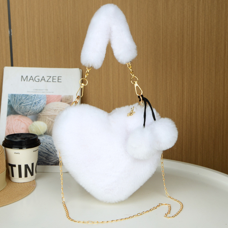 New rabbit fur plush designer cute and fashionable women's hand-held heart-shaped bag, single shoulder slanted body large capacity bag