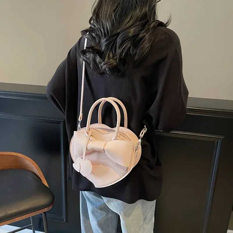 2025 Hot Fashion Popularity Glossy PU Heart Shape Shoulder and Crossbody Bags Solid Zipper Sense of Luxury Handbags for Women Z251018