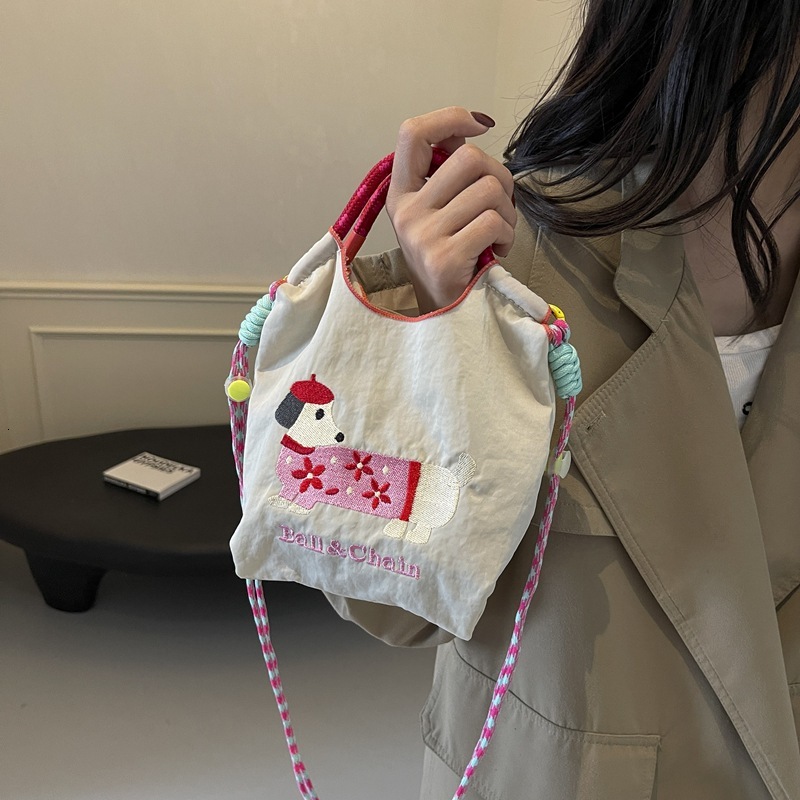 New Korean style designer embroidered cute sausage dog cartoon color blocked women's fashionable handbag multifunctional commuting shoulder bag