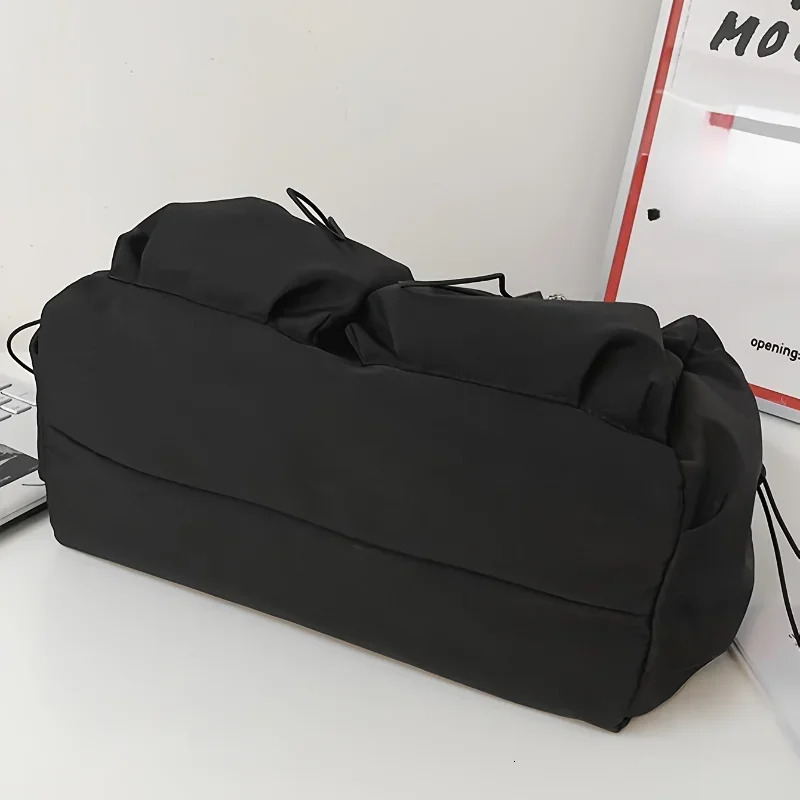 Fashionable Crossbody Bag with Drawstring Accent Spacious Secure Zipper Closure Includes Stylish Bag Charm 251014