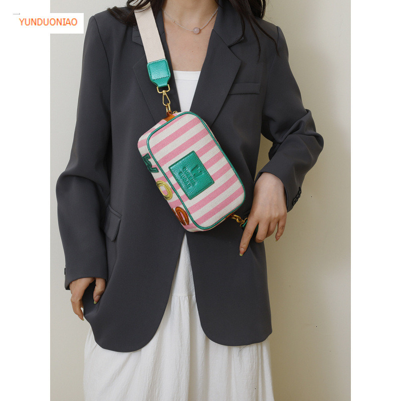 New women's shoulder bag with simple stripes fashionable autumn and winter new designer bag color blocked women's crossbody bag luxury handb