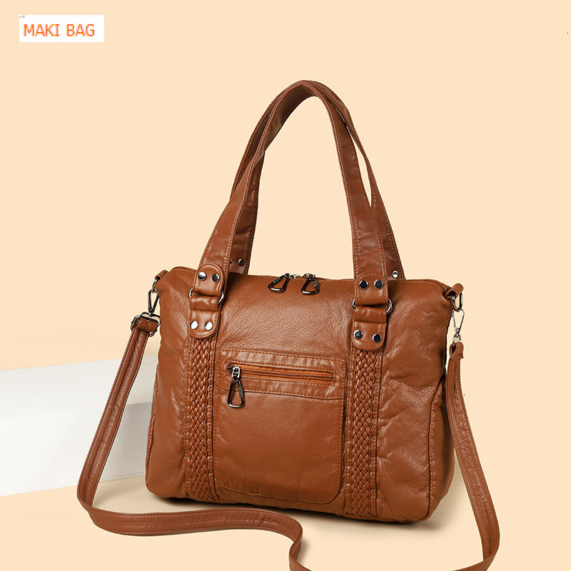 Cross border hot selling French retro motorcycle bag, single shoulder crossbody bag, large capacity women's washable handbag, designer bag