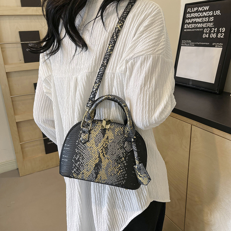Free shipping designer Fashion Bags New women handbag hand-held shell bag snake patterned single shoulder crossbody bag