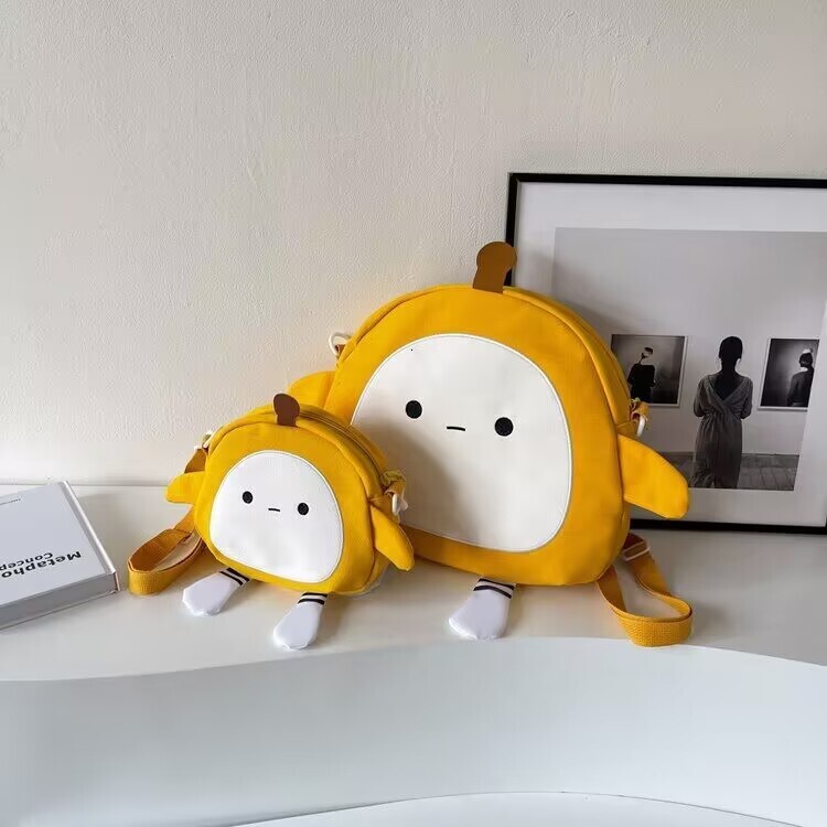 Designer's new fashionable large capacity cartoon canvas bag, cute egg party backpack, casual fashion hot selling small crossbody bag