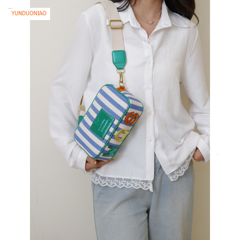 New women's shoulder bag with simple stripes fashionable autumn and winter new designer bag color blocked women's crossbody bag luxury handb