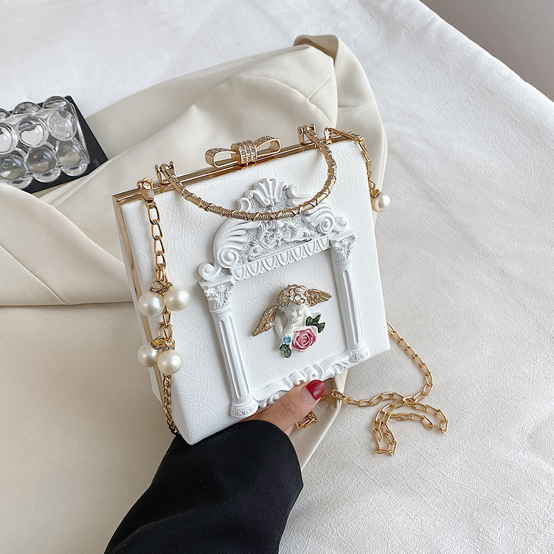 Luxury Brand Designer Bag New Women's Bag Baroque Relief Angel Flower Handheld Chain Bag Niche Single Shoulder Crossbody Bag