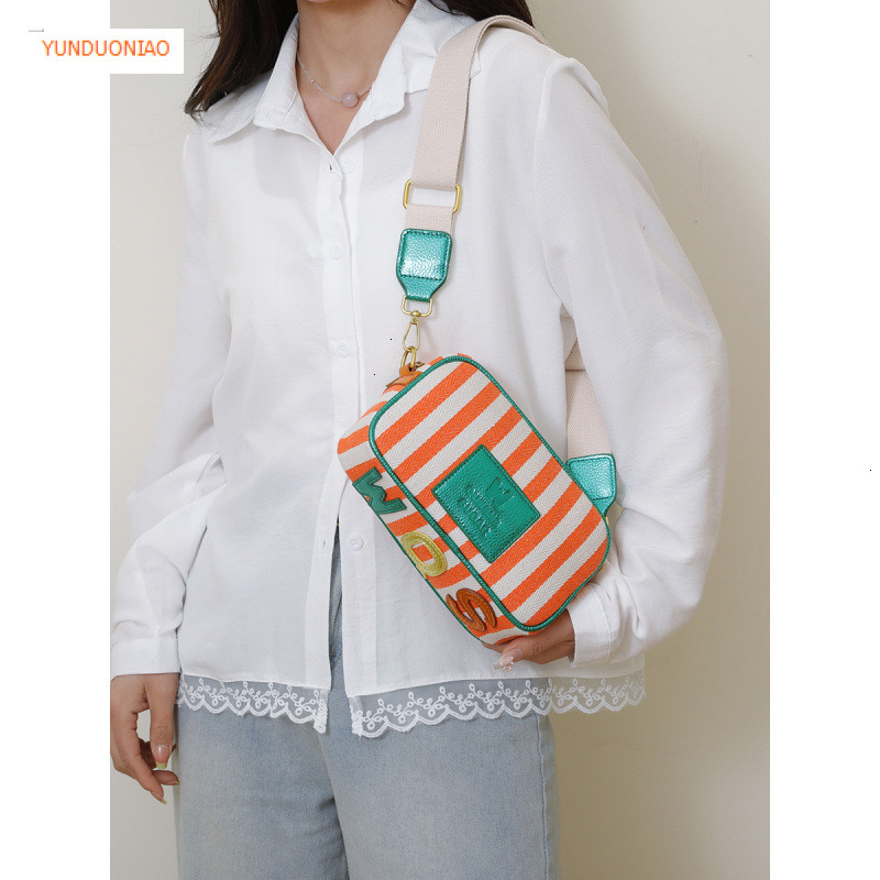 New women's shoulder bag with simple stripes fashionable autumn and winter new designer bag color blocked women's crossbody bag luxury handb