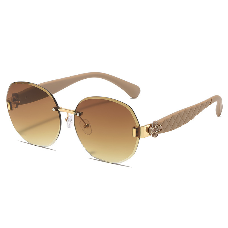 Luxury Brand Designer Jewelry Egg-Shaped Oval Rimless Glasses Wave-Shaped Four-Leaf Clover Temple Sunglasses For Women Fashionable Light Luxury Elegan