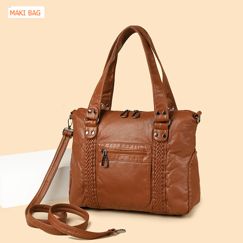 Cross border hot selling French retro motorcycle bag, single shoulder crossbody bag, large capacity women's washable handbag, designer bag