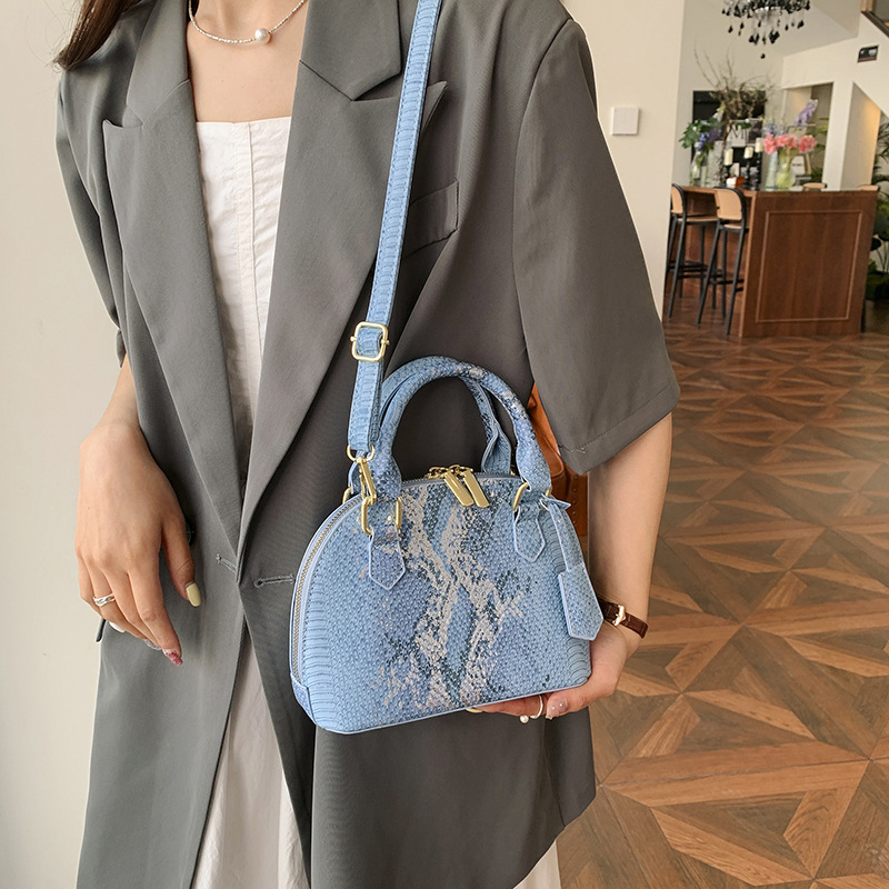 Free shipping designer Fashion Bags New women handbag hand-held shell bag snake patterned single shoulder crossbody bag