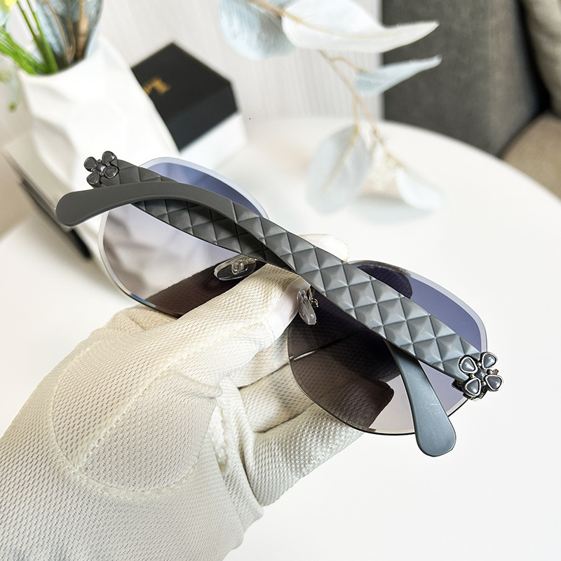 Luxury Brand Designer Jewelry Egg-Shaped Oval Rimless Glasses Wave-Shaped Four-Leaf Clover Temple Sunglasses For Women Fashionable Light Luxury Elegan