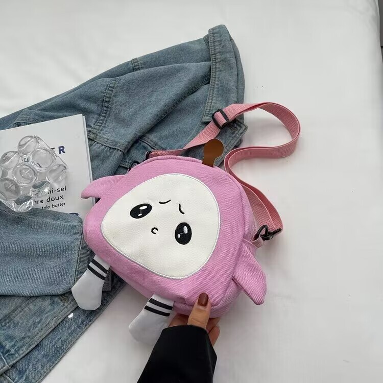 Designer's new fashionable large capacity cartoon canvas bag, cute egg party backpack, casual fashion hot selling small crossbody bag