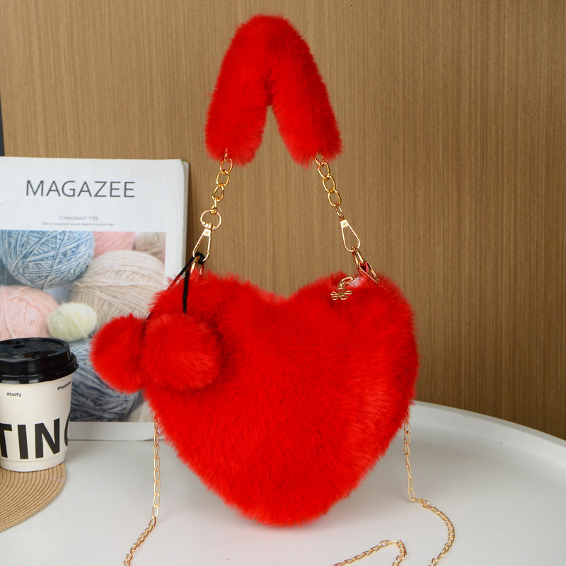 New rabbit fur plush designer cute and fashionable women's hand-held heart-shaped bag, single shoulder slanted body large capacity bag
