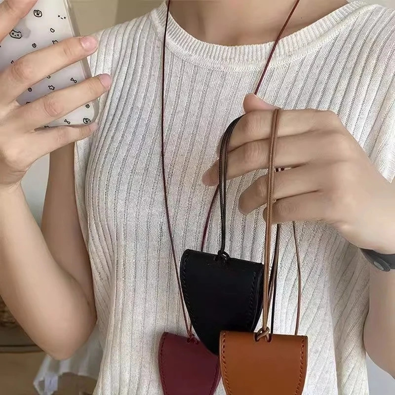 Portable Fashion Leather Eyeglasses Storage Bag Pendant Storage Hanging Rope Sunglasses Clip Glasses Clip Hanging Neck Pouch 251016