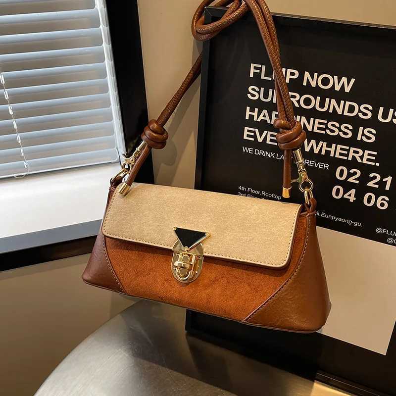 Small niche design patchwork handbag for women 2025 new popular versatile crossbody bags shoulder armpit bag French stick bagT251020