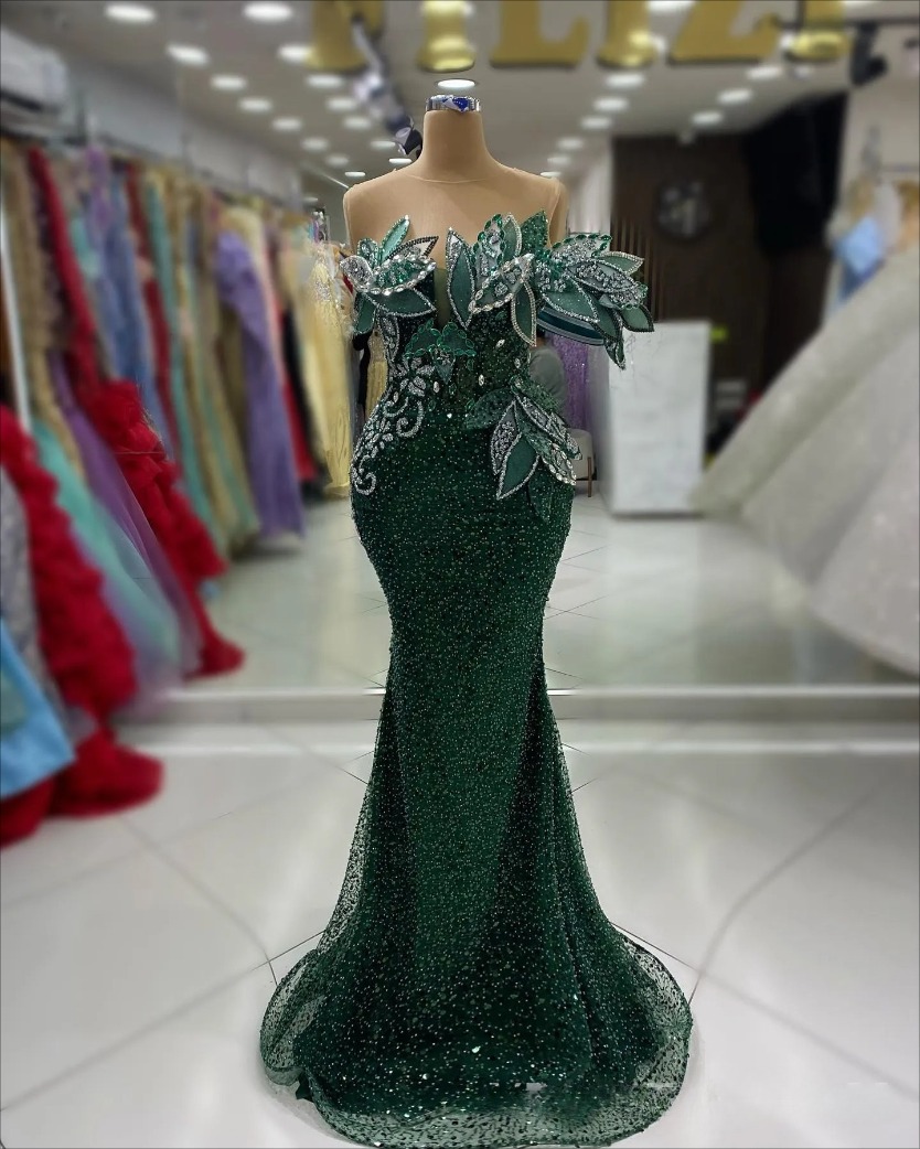 Glitter Green Mermaid Prom Dresses for Black Girls 2026 Special Occasions Sheer Neck Sequined Lace Pearls Decorated Rhinestones Beaded Evening Gala Go