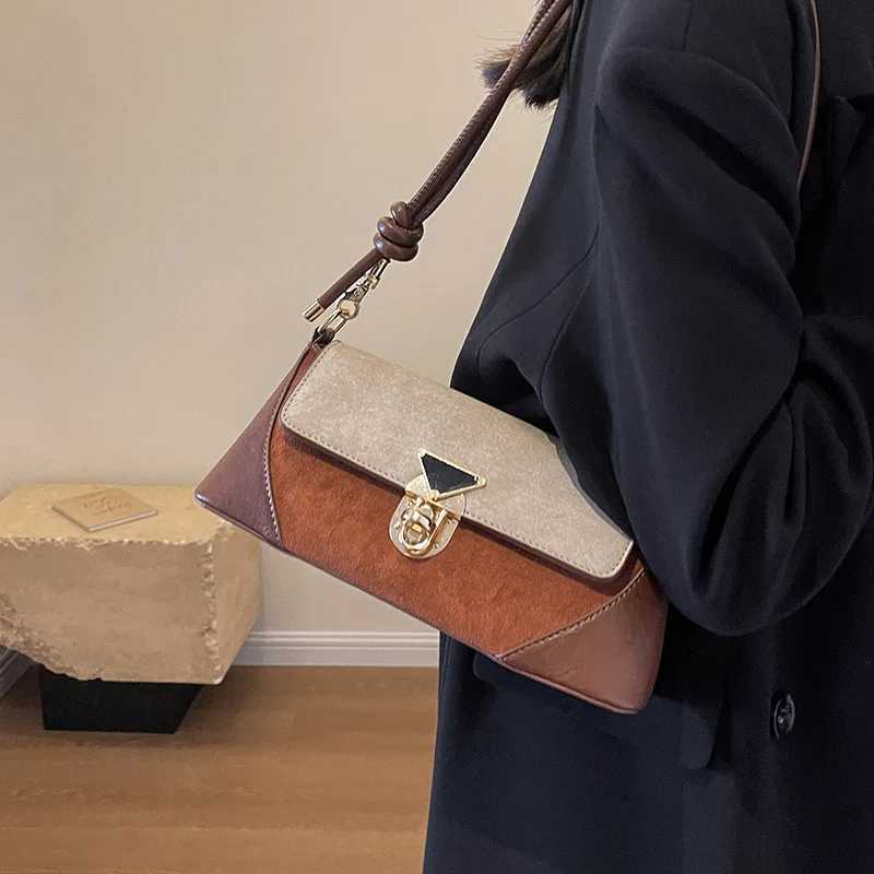 Small niche design patchwork handbag for women 2025 new popular versatile crossbody bags shoulder armpit bag French stick bagT251020