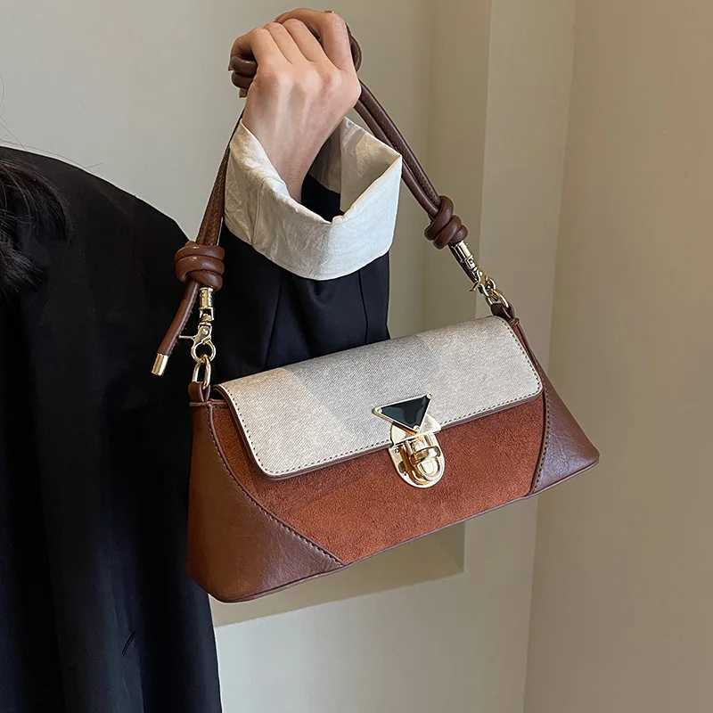 Small niche design patchwork handbag for women 2025 new popular versatile crossbody bags shoulder armpit bag French stick bagT251020