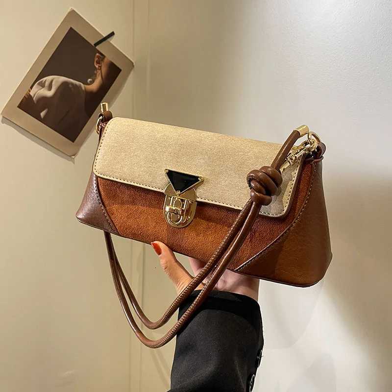 Small niche design patchwork handbag for women 2025 new popular versatile crossbody bags shoulder armpit bag French stick bagT251020