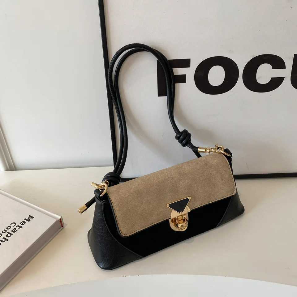 Small niche design patchwork handbag for women 2025 new popular versatile crossbody bags shoulder armpit bag French stick bagT251020