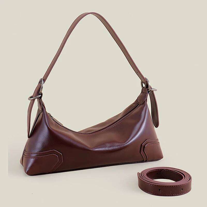 Top Layer Cowhide Handbag New Niche Design Genuine Leather Commuter Crossbody Fashion Vintage Women Armpit Shoulder Bag Suotong251020 Suotong1020