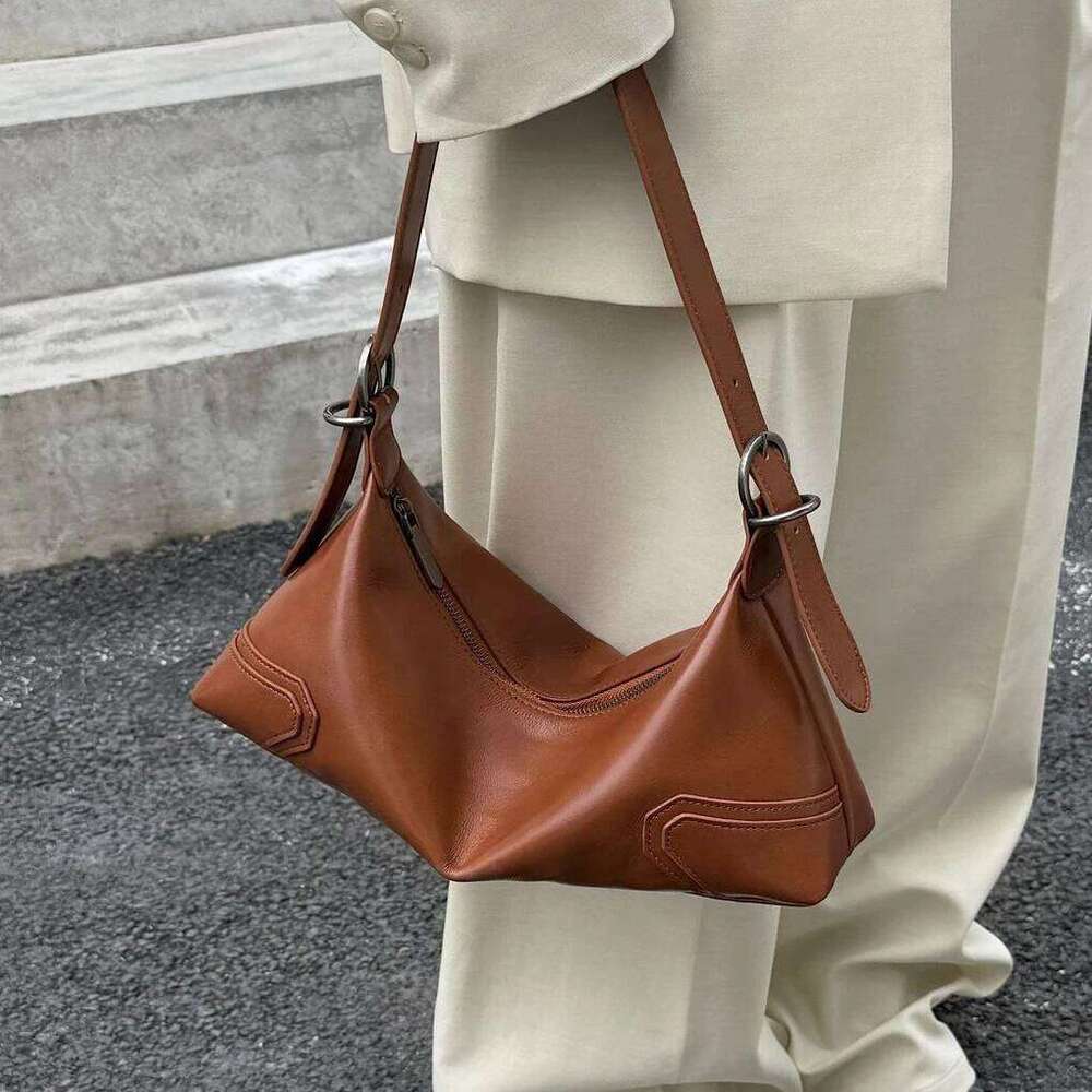 Top Layer Cowhide Handbag New Niche Design Genuine Leather Commuter Crossbody Fashion Vintage Women Armpit Shoulder Bag Suotong251020 Suotong1020