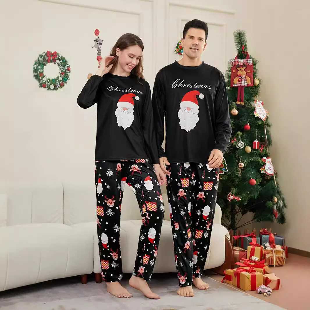 2025 New Christmas parentchild pajamas European and American longsleeved black set Santa Claus reindeer print home wear L2510218R47