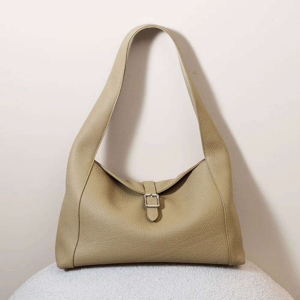 Top Layer Cowhide Women's Armpit New Niche Design Simple Large Capacity High Quality Fashionable Handbag Shoulder Bag Suotong1021