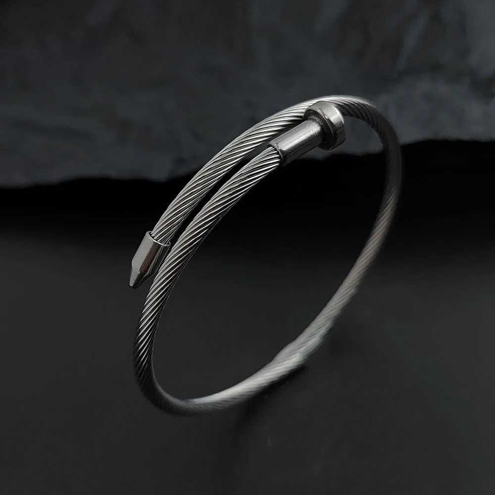 Luxcury Women's Goldtone Silver Finish Water Resistant Nail Design Bangle with Elegant Clasp Detailing