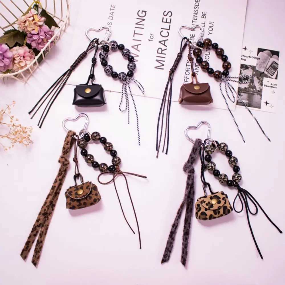 Leather Rope Luxury Bag Key Chain Coin Purse Exquisite Luxury Bag Lucky Pendant Leopard Print Crafts Car Key Ring Bag Hanging W251021