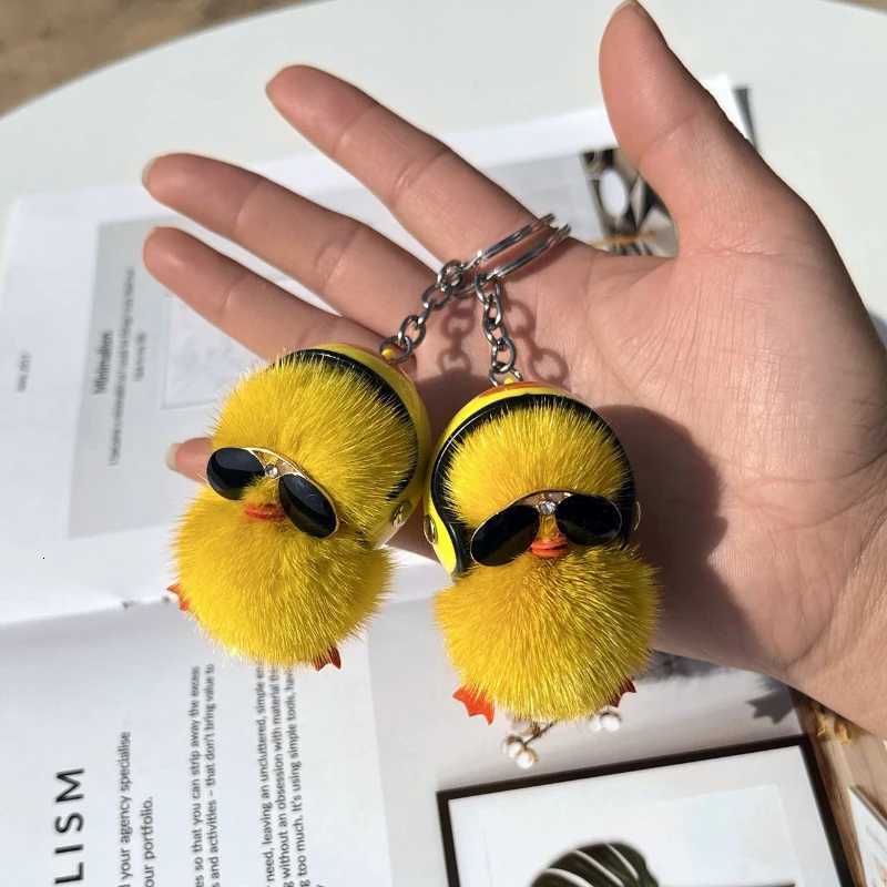 Cute Woman Keychain A Cool Duck with Helmet and Eyes Mink Hair Little Duck Plush Bag Pendant Car Keychain W251021