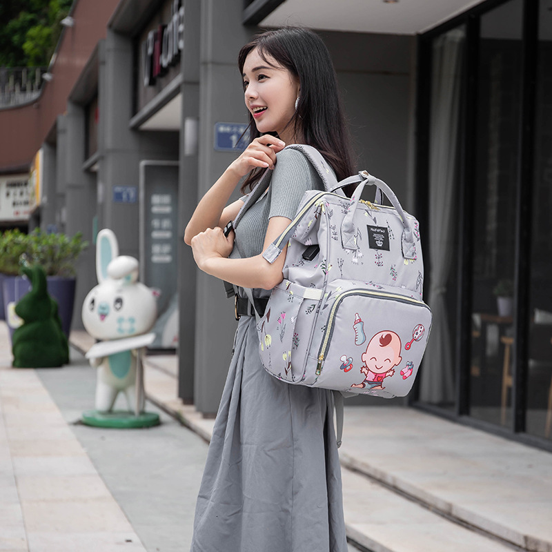 Fashion designer mommy bag multifunctional backpack mother and baby bag mommy bag handheld diaper bag lightweight mother and baby essential